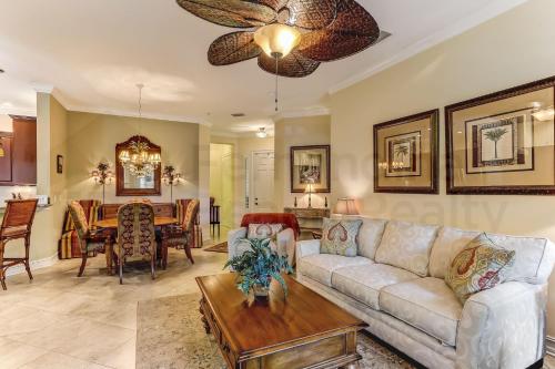 a living room with a couch and a table at Gated Villas at Summer Beach in Amelia Island
