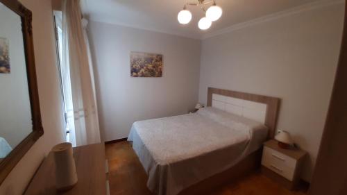 Postel nebo postele na pokoji v ubytování TAC -Tu Alojamiento Céntrico