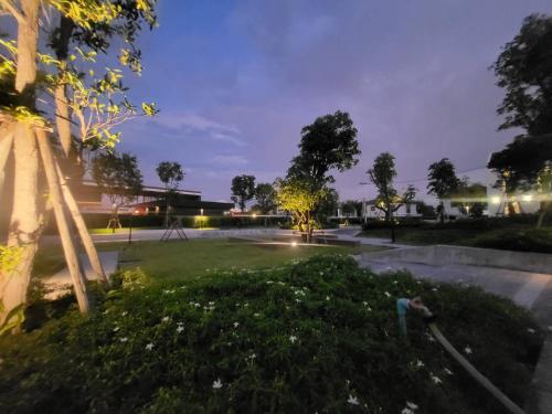 a park at night with the lights on at MOST Family 456/66 Ubon-Thailand in Ubon Ratchathani