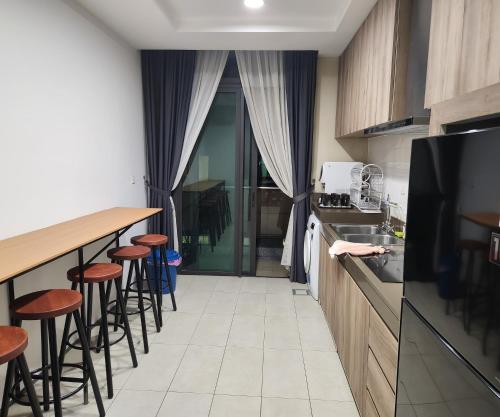 Η κουζίνα ή μικρή κουζίνα στο My Misto Homestay, Riverson Soho