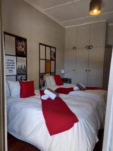 Кровать или кровати в номере Die Windpomp Guesthouse