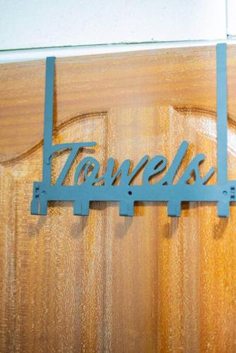 a sign that says turkey hanging on a wooden wall at Forget your worries in this serene 5 Bedroom Villa in Ngong in Nairobi