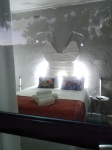 Кровать или кровати в номере Die Windpomp Guesthouse