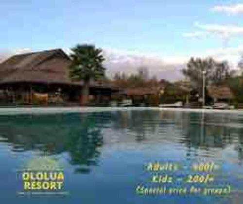 a picture of a swimming pool with the words dublin resort at Forget your worries in this serene 5 Bedroom Villa in Ngong in Nairobi