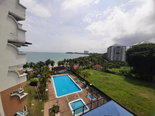 a view of the ocean from a building at Seri Bulan Condo in Port Dickson