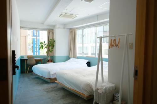 Katil atau katil-katil dalam bilik di HafH Fukuoka THE LIFE