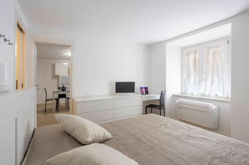 Ένα ή περισσότερα κρεβάτια σε δωμάτιο στο Luxury Appartament Piazza Roma