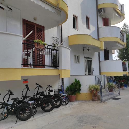 a group of bikes parked next to a building at B&B Leonida in Tropea
