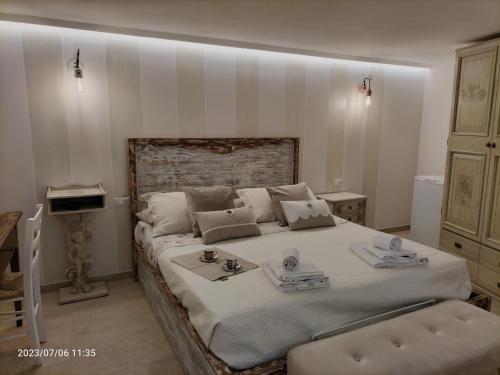 Ένα ή περισσότερα κρεβάτια σε δωμάτιο στο Il giardino delle Fate