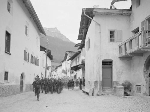 a group of soldiers walking down a street at Ferienwohnung Banca Veglia in Sta Maria Val Müstair