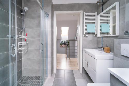 Kúpeľňa v ubytovaní Apartamenty Eksploris II