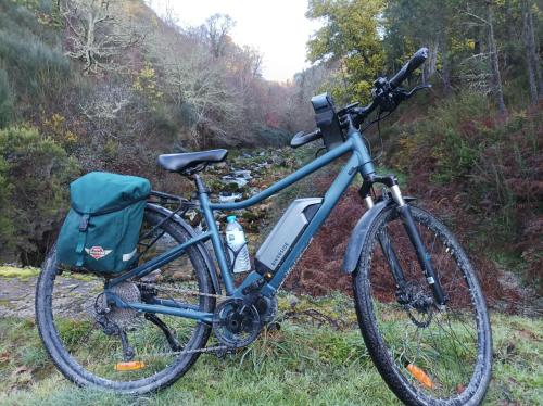 a bike parked on the side of a trail at Quinta Ecológica da Peneda Agroturismo by Peneda ecofarm in Arcos de Valdevez