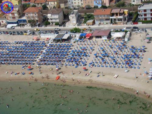 an aerial view of a beach with a crowd of people at Birilli B&B in Civitanova Marche