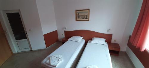 Katil atau katil-katil dalam bilik di Hotel Morski Dar
