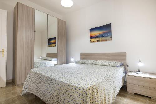 Ένα ή περισσότερα κρεβάτια σε δωμάτιο στο Residence Dolce Vita