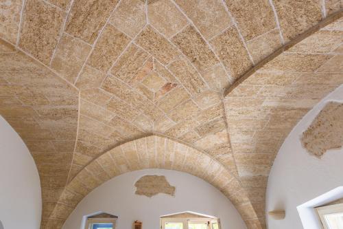 an example of a coffered ceiling in a church at Casa delle sorgenti in Torre Vado