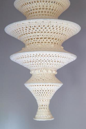 two white vases sitting on a table at 't Hooiland in Lo-Reninge