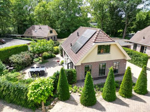 a model of a house with a garden at LUXE vakantiehuis voor 6P voorzien van alle gemakken @Veluwe in Nijkerk