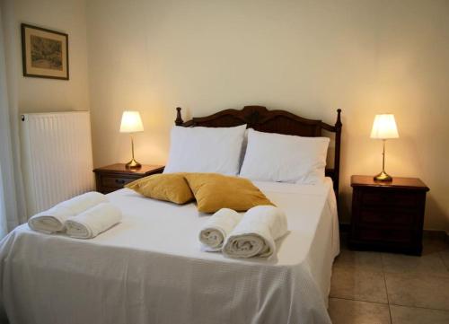 Postel nebo postele na pokoji v ubytování Luna Apartment, Rafina