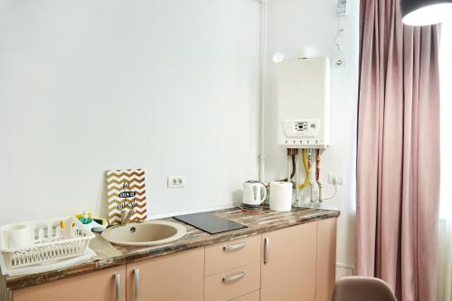 Кухня или мини-кухня в Excelsior Apartaments Mamaia Nord
