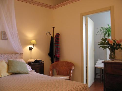 Postel nebo postele na pokoji v ubytování Agriturismo Floriani