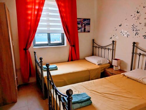 Postel nebo postele na pokoji v ubytování Bright & Airy sea views apartment