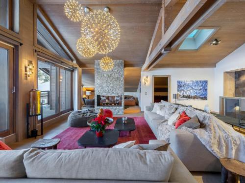 Khu vực ghế ngồi tại Penthouse à Megève avec Jacuzzi, Sauna, Piscine & Salle de Sport - FR-1-569-27