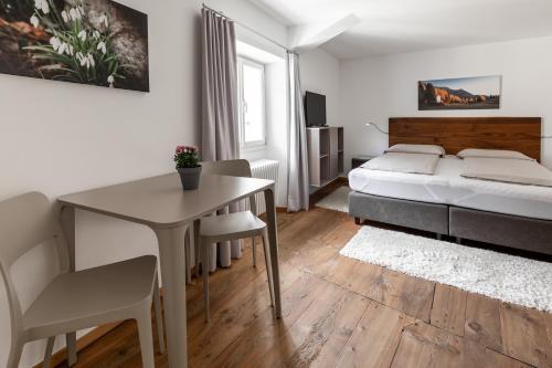 Ca' del Borgo, Rooms & Suitesにあるベッド