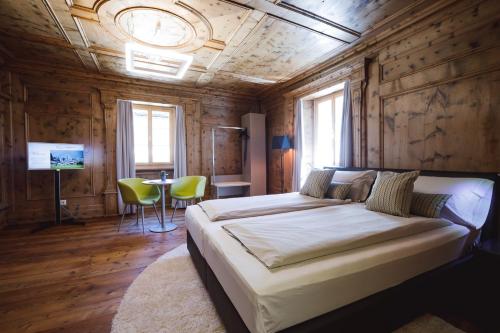 Ca' del Borgo, Rooms & Suitesにあるベッド