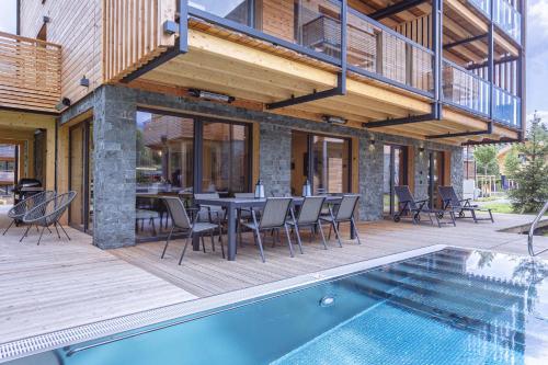 Piscina en o cerca de Kreischberg Pool Villas & Penthouses by ALPS RESORTS