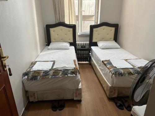 A bed or beds in a room at Hotel Hoyuk