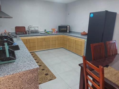 Kuchyňa alebo kuchynka v ubytovaní Ghougine Serenity Residence Bis