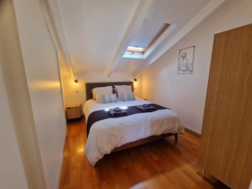 Ένα ή περισσότερα κρεβάτια σε δωμάτιο στο Le Michelangelo - Place Masséna