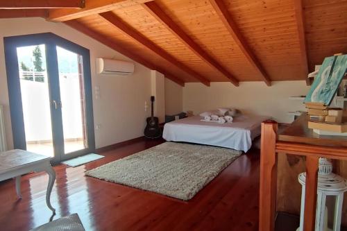 Postel nebo postele na pokoji v ubytování Villa Demy