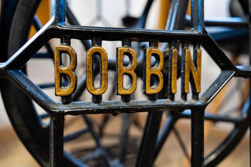 a metal sign with the word boston on it at Dom Krawca - pod Chojnikiem in Jelenia Góra