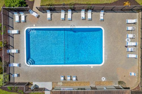 an overhead view of a swimming pool on a building at Southwinds, Unit H13 in Atlantic Beach