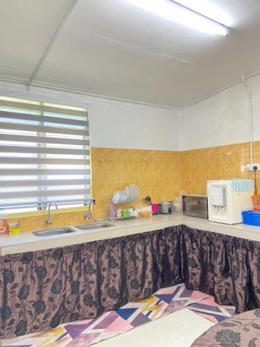 Η κουζίνα ή μικρή κουζίνα στο ELLY HOMESTAY