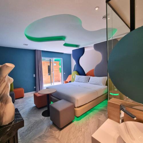 Katil atau katil-katil dalam bilik di Hotel Avenue - Lovely hotel