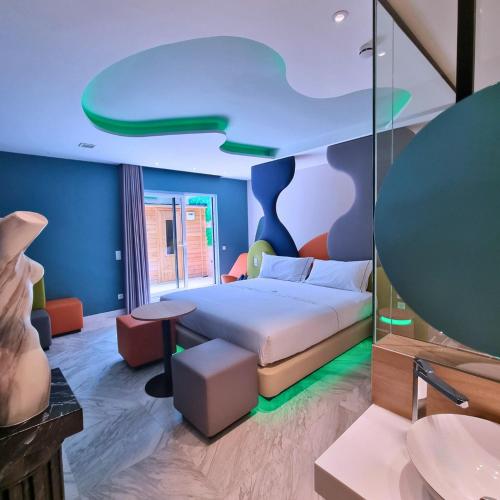 Katil atau katil-katil dalam bilik di Hotel Avenue - Lovely hotel