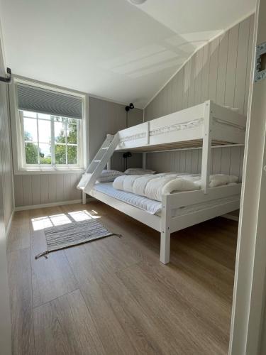 Llit o llits en una habitació de Vestby Park
