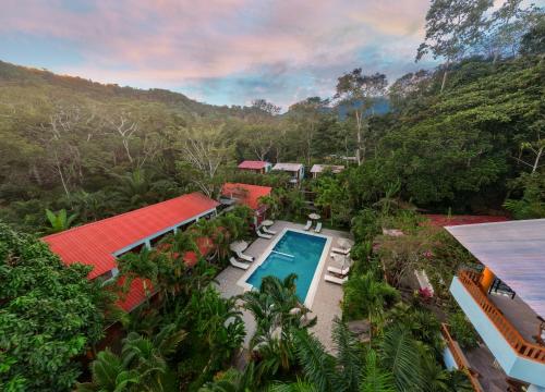 an aerial view of a house with a swimming pool at Villa Lu Amazon Ecolodge in Tarapoto