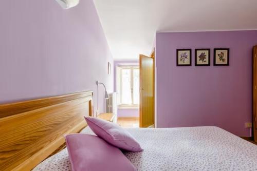 Postel nebo postele na pokoji v ubytování Agriturismo il Castello