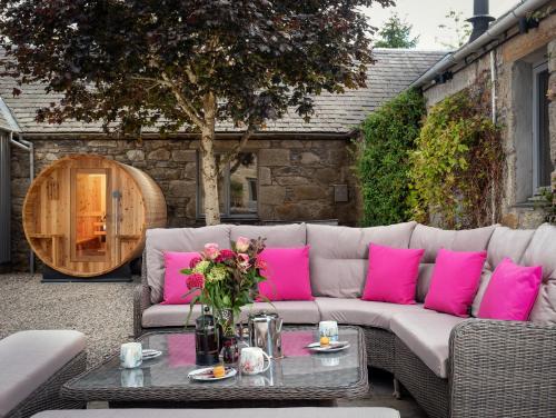 Zona de estar de The Eagle's Nest - large house with hot tub and sauna