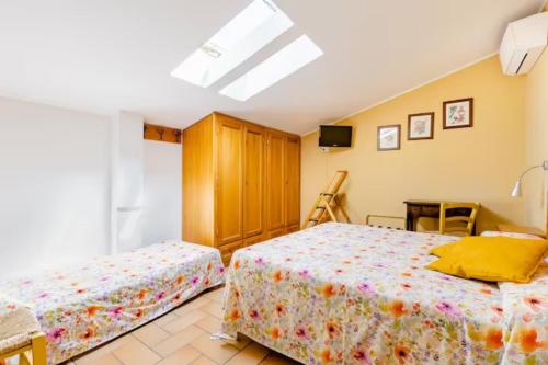 Postel nebo postele na pokoji v ubytování Agriturismo il Castello