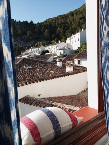 a view from a window of a roof at Hospederia Casa de las Piedras in Grazalema