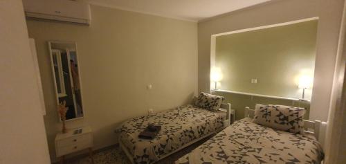 Ένα ή περισσότερα κρεβάτια σε δωμάτιο στο Vatos 2 bedroom apartment
