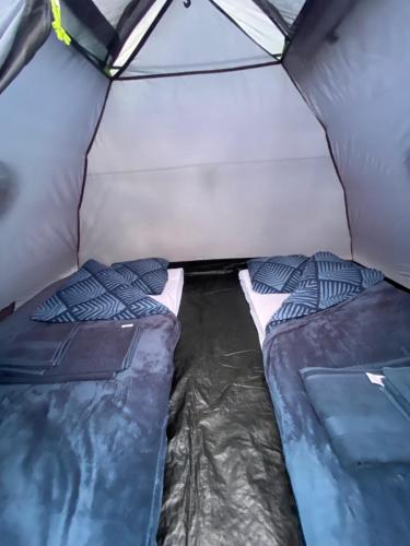 En eller flere senger på et rom på Osada na Cyplu pole namiotowe i campingowe