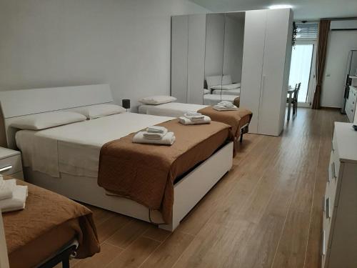Ένα ή περισσότερα κρεβάτια σε δωμάτιο στο Casa Guttuso 1