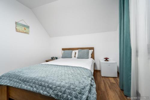 Postel nebo postele na pokoji v ubytování Casa Dora
