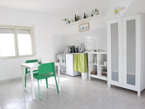 Kuchyň nebo kuchyňský kout v ubytování Rosso di Sera Loft